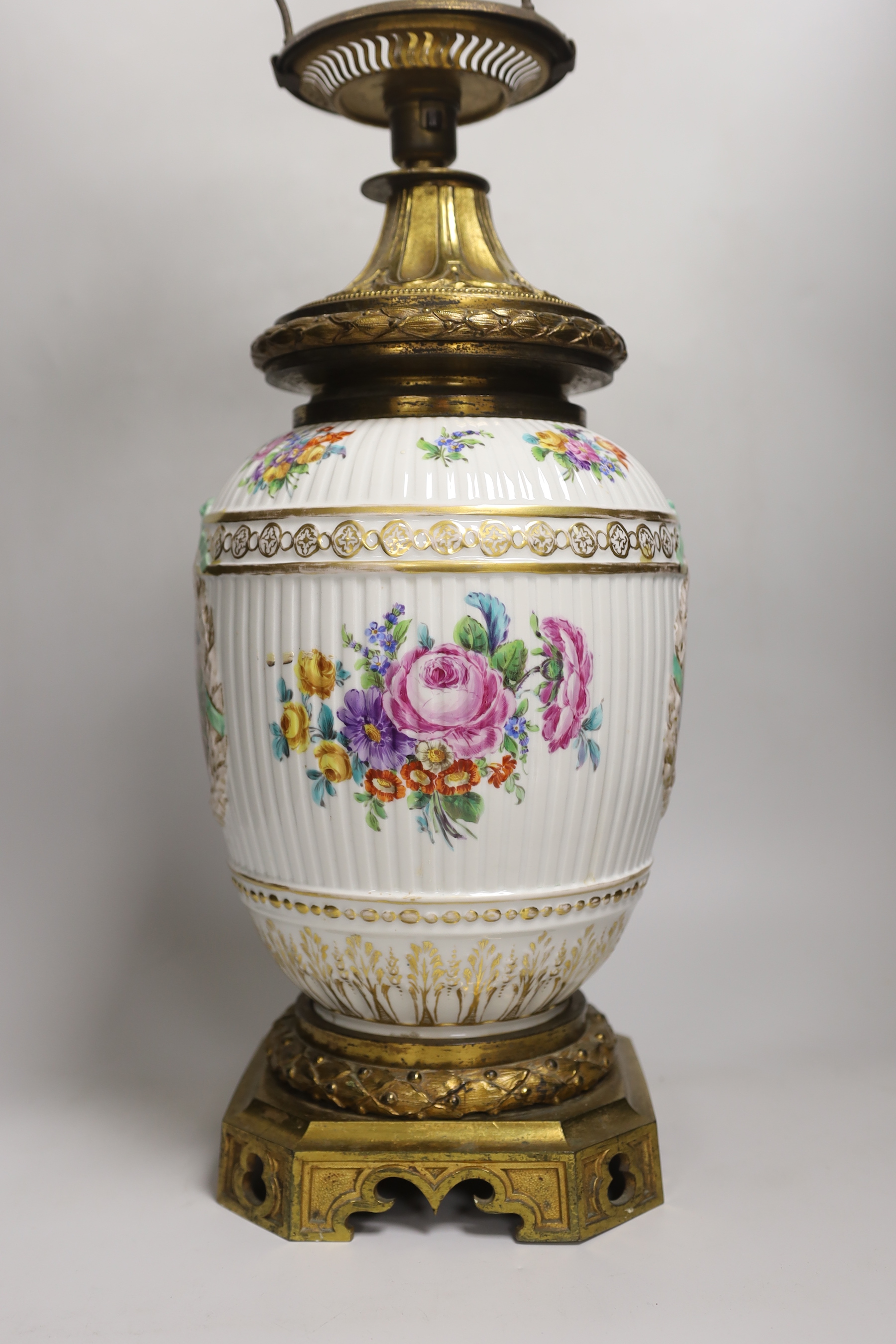 A 19th century ormolu mounted German porcelain table lamp